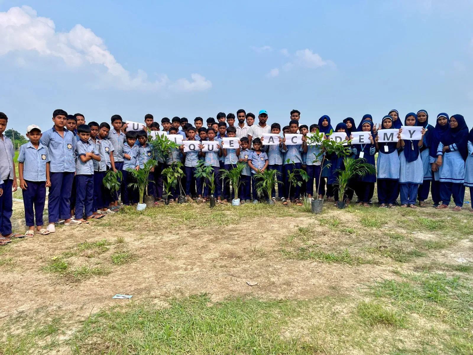 Children posing together for a photo